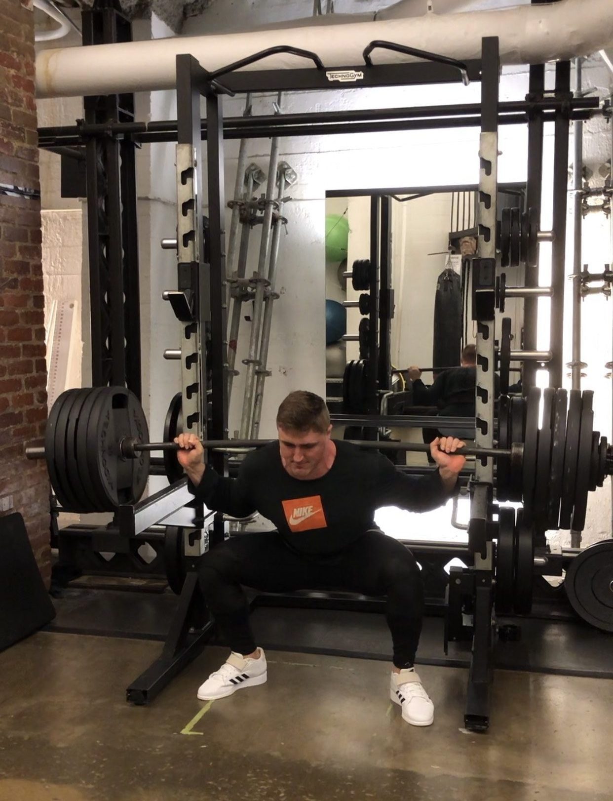 man working out at kalev fitness