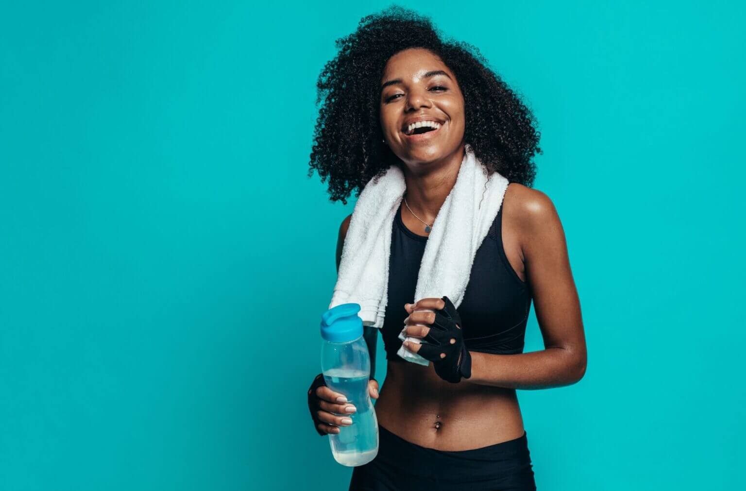 2024 Fitness Motivation featuring a smiling woman in workout gear with a towel and water bottle against a vibrant teal background.